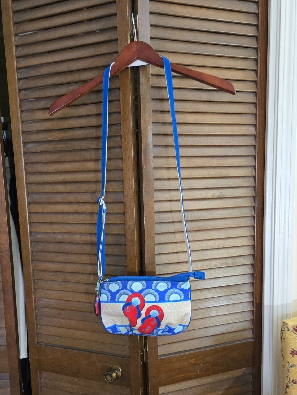 Blue Patterned Crossbody Bag with Red Accents